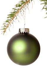 Image showing Christmas ball hanging from a branch of a fir tree