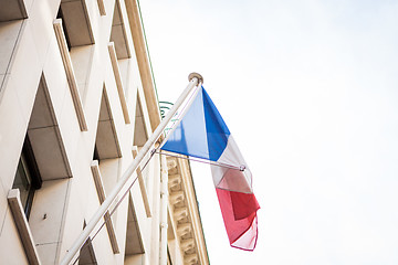 Image showing Flag of France fluttering under a serene blue sky