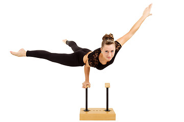 Image showing Young professional gymnast woman