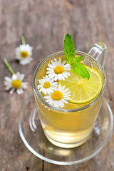 Image showing Chamomile tea in a glass cup 