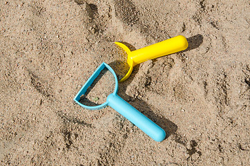 Image showing Toys in a sandbox closeup