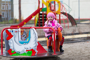 Image showing girl on the carousel