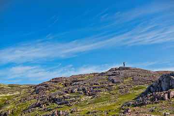 Image showing Man with a backpack on a mountain