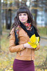 Image showing Portrait of a beautiful girl in the autumn forest