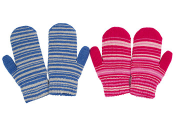 Image showing Two pairs of mittens, blue and red.