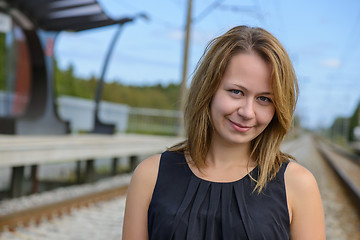 Image showing Portrait of girl near railway station