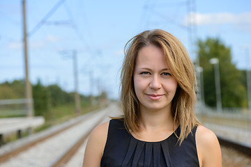 Image showing Portrait of girl near railway path