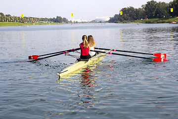 Image showing Two girls in a boat