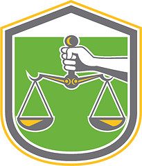 Image showing Hand Holding Scales of Justice Shield Retro