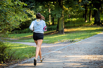 Image showing Young female jogger