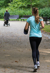 Image showing Young female jogger