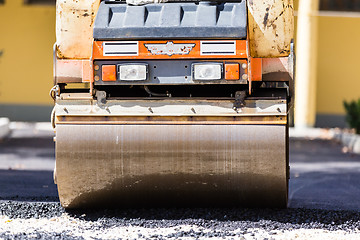 Image showing Asphalt surfacing manual labor.