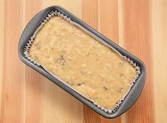 Image showing Raw banana loaf batter in a lined tin 