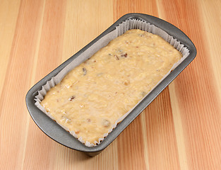 Image showing Banana bread batter in a loaf tin