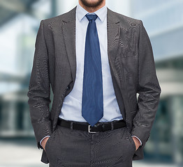 Image showing close up of businessman standing outdoors