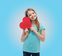 Image showing smiling little girl with red heart