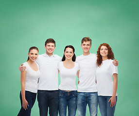 Image showing group of smiling teenagers in white blank t-shirts