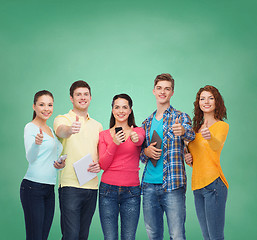 Image showing group of teenagers with smartphones and tablet pc