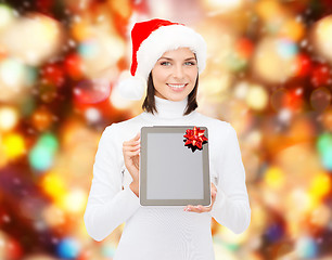 Image showing woman in santa helper hat with tablet pc