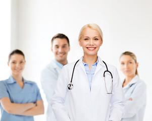 Image showing smiling female doctor with stethoscope