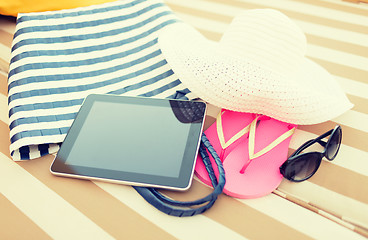 Image showing close up of tablet pc on beach