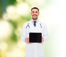 Image showing smiling male doctor with tablet pc