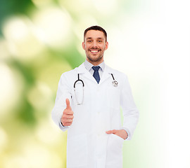 Image showing smiling doctor with stethoscope showing thumbs up