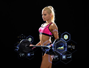 Image showing sporty woman exercising with barbell