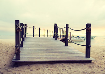 Image showing close up of pier on tropical beach