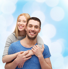 Image showing smiling couple hugging