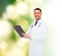 Image showing smiling male doctor with clipboard and stethoscope