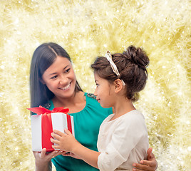 Image showing happy mother and child girl with gift box