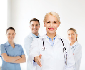 Image showing smiling female doctor with stethoscope