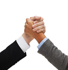 Image showing hands of two people armwrestling