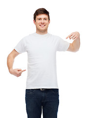 Image showing smiling young man in blank white t-shirt