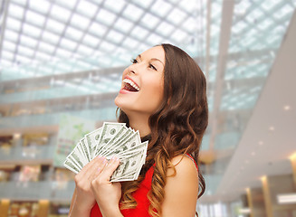 Image showing woman in red dress with us dollar money