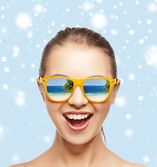 Image showing happy screaming teenage girl in shades