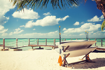 Image showing surfboards on tropical beach