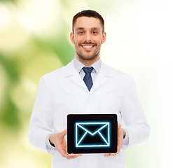 Image showing smiling male doctor with tablet pc