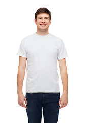 Image showing smiling young man in blank white t-shirt