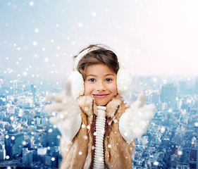 Image showing smiling little girl in winter clothes