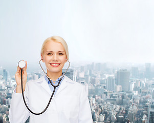 Image showing smiling female doctor with stethoscope