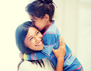 Image showing hugging mother and daughter