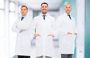 Image showing smiling male doctors in white coats