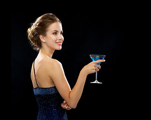 Image showing smiling woman holding cocktail
