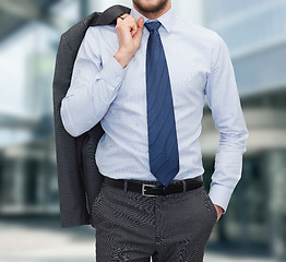 Image showing close up of businessman standing outdoors