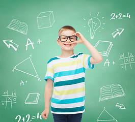 Image showing smiling little boy in eyeglasses