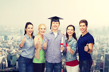 Image showing group of students with diploma showing thumbs up