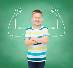 Image showing little boy in casual clothes with arms crossed