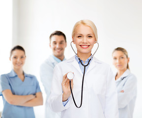 Image showing smiling female doctor with stethoscope